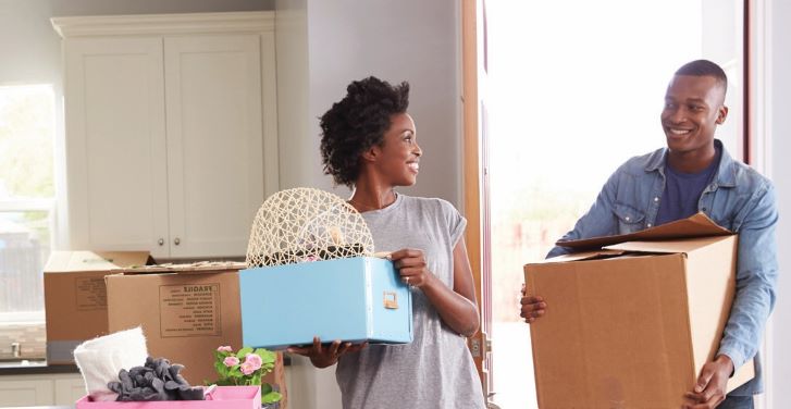 Couple moving into new home